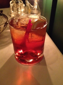 Ascots Negroni in Hamilton Bermuda served in dimpled glass with very basic garnish